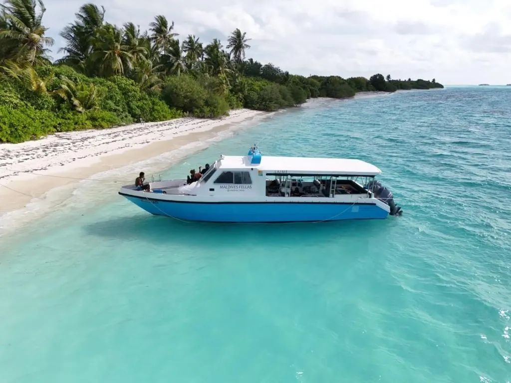 Maldives boat by the beach